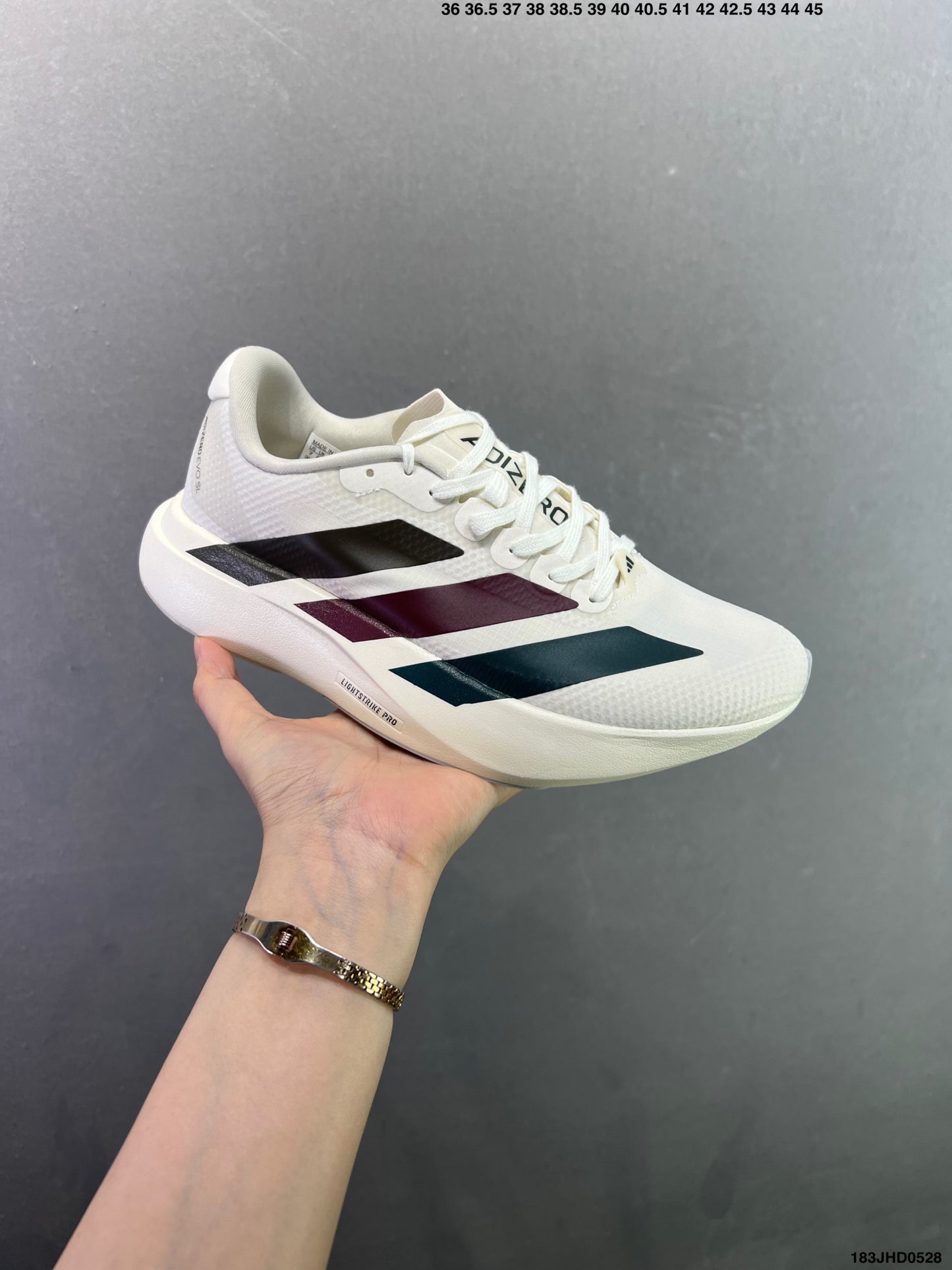 Adizero Evo SL WOVEN M  183JHD0528