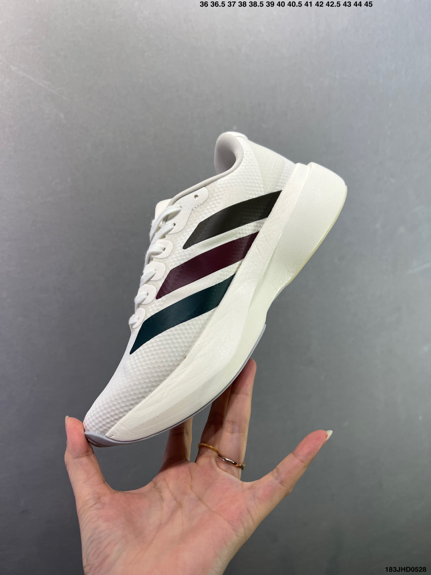 Adizero Evo SL WOVEN M  183JHD0528